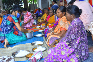 Elderly poor women having nutritious food