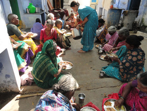 indian ngo serving meals to old people