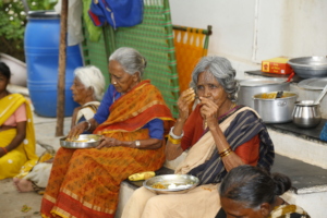 midday meal sponsorship to poor elderly persons in