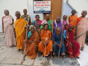 Care for elderly people in india giving food