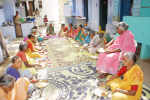 poor senior citizens having midday meal in india