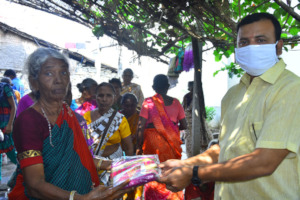 sponsorship of clothes to poor old age woman india