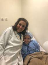 Dr El Sisi and a happy young patient