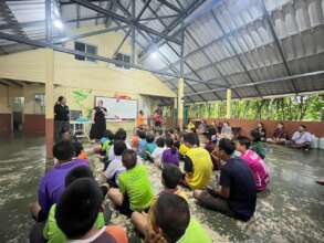 The HUG Team conducting training at a local school