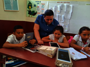 Students at La Libertad working with their tablets