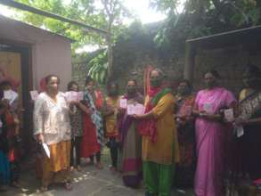 Women Receiving COVID Supplies
