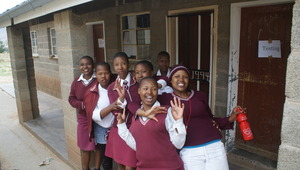 Girls outside of a testing room during an event