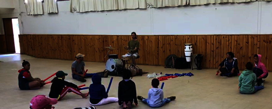 Mr Fowler at a drum lesson in Stanford