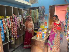 Maryam in her community store