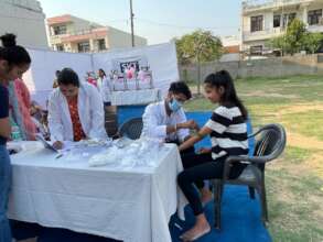 Taking a blood sample for anemia test