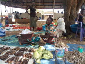 Maria in her business at the local market