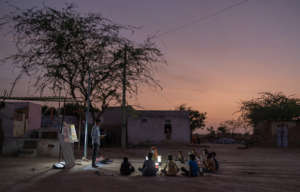 Shankar Jat teaches students at the night school.