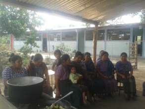 Mothers learning to prepare nutritious meals