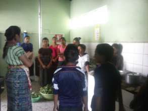 Students participate in a cooking class