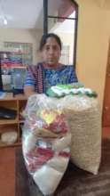 mother picking up monthly food basket!