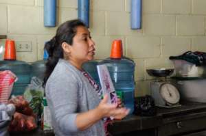 Nutrition educator Sandy leads a cooking workshop