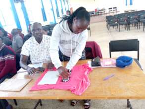 Teachers making Reusable Sanitary Kits