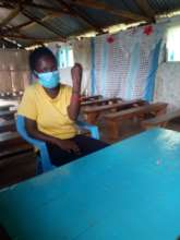 Participant making the menstruation braclet
