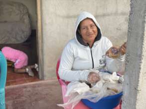 Petrona selling cornbread following CEPAD training