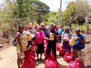 Families receiving their food package