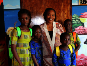 Leymah Gbowee and GPFA Book Bag Drive recipients