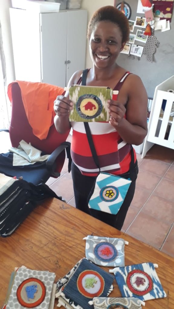 Reaboka crafter showing off her work