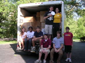 Julie-Anne and Co-Founders prepare first shipment.