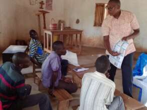 Explaining the programme to husbands of farmers