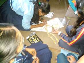 Girl students working passionately