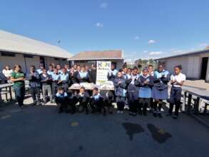 Learners excited with their new stationery.