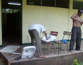 Men working to repair bathrooms