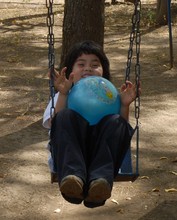 Verbo girl on old swingset