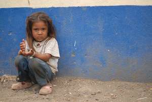 Little girl who needs to be in school.