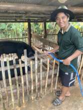 Sela providing the proper care for his pigs.