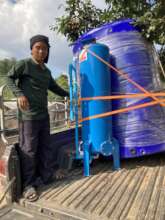 Sela receiving the water tank and filter.