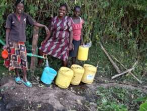 Women collecting water at Kaptembwo spring