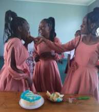 Joyce enjoying her graduation cake
