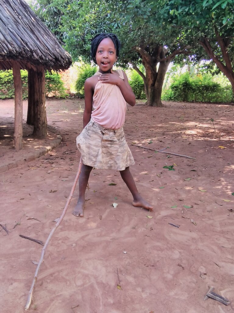 Hungry street child, looking for her meal