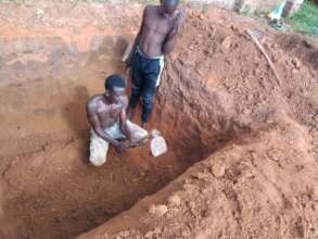 Pit latrine digging , community support