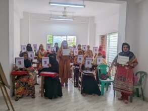 CHWs with their MAITS manuals