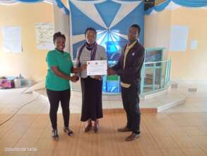 Caroline Chelangat presenting teacher training