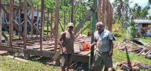 The chainsaw turns downed trees into timber!