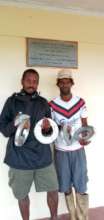 Fiji coastal village men prepare to work