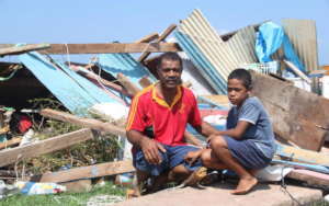 Father and son face the damage of Cyclone Yasa