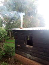 Chimney extracting smoke from Glady's stove