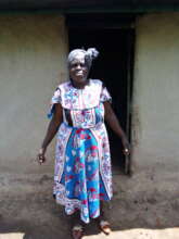 Grace at the door to her kitchen