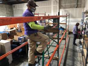 Putting in wall units at the new warehouse