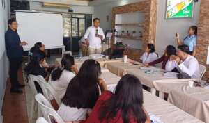 Public speaking workshop, student giving speech
