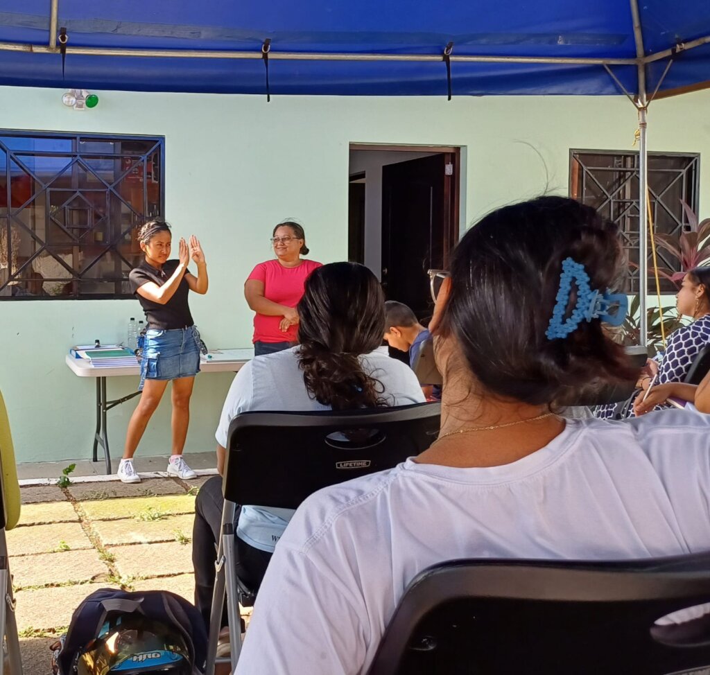 Yohana quizzing class on a word