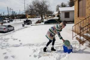 Austin, TX woman gathering water to boil
